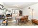 Bright dining area features wood floors and a large sliding glass door to the yard at 664 N County Road 800 E, Avon, IN 46123