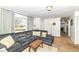 Inviting living room offers ample natural light, comfortable sofa and views of the neighborhood at 664 N County Road 800 E, Avon, IN 46123