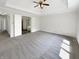 Spacious main bedroom featuring tray ceilings, ceiling fan and an ensuite bathroom at 6915 Juliet Dr, Avon, IN 46123