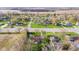 Beautiful aerial view of a peaceful neighborhood with mature trees and inviting homes at 7008 E Jackson St, Muncie, IN 47303