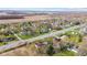 Expansive aerial view of a charming neighborhood with tree-lined streets and well-maintained homes at 7008 E Jackson St, Muncie, IN 47303
