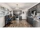 Modern kitchen with stainless steel appliances and gray cabinetry at 7008 E Jackson St, Muncie, IN 47303