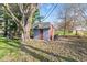 Charming outbuilding with character and a tire swing at 7008 E Jackson St, Muncie, IN 47303