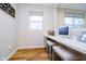 Home office with built in desk, storage drawers, task lighting, and comfortable seating, ideal for remote work at 7158 Sugar Maple Ln, Brownsburg, IN 46112