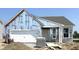 Charming one-story home featuring an attached garage and inviting covered porch in a vibrant community at 778 Oakleaf Dr, Greenfield, IN 46140