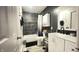 Stylish bathroom features modern vanity, tile shower, and neutral tones at 8006 Sunfield Ct, Indianapolis, IN 46214
