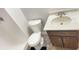 Bright bathroom with toilet, sink, and shower at 8006 Sunfield Ct, Indianapolis, IN 46214