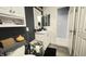 This modern bathroom features updated cabinets, toilet and mirror at 8006 Sunfield Ct, Indianapolis, IN 46214