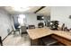 The dining room is open to the kitchen and features an island, a table, and modern decor at 8006 Sunfield Ct, Indianapolis, IN 46214