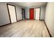 Spacious living room features wood-look floors and neutral paint at 8006 Sunfield Ct, Indianapolis, IN 46214