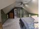 The bedroom features green walls, carpet, and a bed near a doorway at 8017 Dogwood Ct, Plainfield, IN 46168