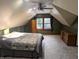 The spacious bedroom has green walls, carpet, and a window with storage space on either side at 8017 Dogwood Ct, Plainfield, IN 46168