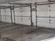 Spacious garage featuring multiple door bays, offering ample parking and storage at 8017 Dogwood Ct, Plainfield, IN 46168