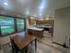 Spacious kitchen with modern appliances and an adjacent dining area at 8017 Dogwood Ct, Plainfield, IN 46168