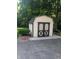 Storage shed with double doors, offering extra storage space and convenience at 8017 Dogwood Ct, Plainfield, IN 46168
