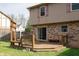 A wood deck is attached to the home, adding outdoor space and features a built-in bench at 8122 Tanager Ct, Indianapolis, IN 46256