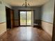 Dining room features hardwood floors and sliding glass door to the deck at 8122 Tanager Ct, Indianapolis, IN 46256
