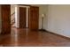 Bright living room with hardwood floors and a view of the staircase at 8122 Tanager Ct, Indianapolis, IN 46256