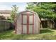 A shed in the backyard provides a private storage space for lawn and garden equipment at 8122 Tanager Ct, Indianapolis, IN 46256