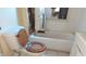 Bathroom with a toilet, tub, and window that needs remodeling and repair at 822 N Bradley Ave, Indianapolis, IN 46201