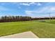 Large, level backyard with a full wooden privacy fence, perfect for outdoor activities and entertaining at 8442 Averly Park Dr, Indianapolis, IN 46237