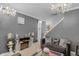 Sophisticated living area showcasing elegant decor, soft lighting, and plush seating for a comfortable and luxurious ambiance at 8442 Averly Park Dr, Indianapolis, IN 46237