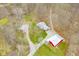 Overhead view showcasing the property with multiple structures and a winding driveway at 8503 Bean Blossom Rd, Trafalgar, IN 46181