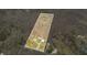 Aerial view highlighting property boundaries and wooded surroundings at 8503 Bean Blossom Rd, Trafalgar, IN 46181