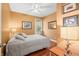 Cozy bedroom with natural light, ceiling fan, and neutral decor for a warm, inviting atmosphere at 8503 Bean Blossom Rd, Trafalgar, IN 46181