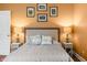 Comfortable bedroom featuring neutral walls and two side tables with lamps at 8503 Bean Blossom Rd, Trafalgar, IN 46181