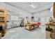 This is a large garage space or workshop with places to work and room for projects at 8503 Bean Blossom Rd, Trafalgar, IN 46181