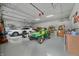 Bright garage with parking for two cars and a John Deere at 8503 Bean Blossom Rd, Trafalgar, IN 46181