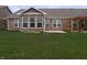 A spacious backyard features a patio and a pergola at 8801 Twain Ln, Indianapolis, IN 46239
