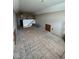Expansive upstairs bonus room with plywood flooring ready to be finished into a custom living space at 8801 Twain Ln, Indianapolis, IN 46239