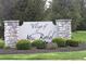 Stone sign at entrance to Village of New Bethel at 8801 Twain Ln, Indianapolis, IN 46239