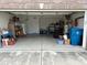 Spacious, organized garage offering ample parking and storage space for vehicles and household items at 8801 Twain Ln, Indianapolis, IN 46239