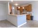 A kitchen features ample counter space, cabinetry and modern lighting at 8801 Twain Ln, Indianapolis, IN 46239