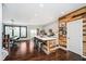 Modern kitchen featuring a large center island, stainless appliances, and open dining area at 9010 Ramapo Dr, Fishers, IN 46038
