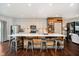 Beautiful kitchen with stainless appliances, a large island with seating, and stylish cabinets at 9010 Ramapo Dr, Fishers, IN 46038