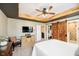 A spacious main bedroom featuring a flat-screen TV and access to the bathroom and walk-in closet at 9010 Ramapo Dr, Fishers, IN 46038