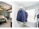 A spacious walk-in closet adjacent to the main bedroom with shelves and hanging space at 9010 Ramapo Dr, Fishers, IN 46038