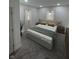 Serene bedroom with neutral colors, cozy carpet, and soft natural light creates a relaxing retreat at 905 W 3Rd St, Anderson, IN 46016