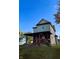 Charming two-story home with a welcoming front porch and well-maintained lawn, perfect for enjoying outdoor living at 905 W 3Rd St, Anderson, IN 46016