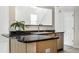 Kitchen counter with stainless steel dishwasher and sink with granite countertop at 9338 Eden Woods Ct, Indianapolis, IN 46260