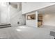 Spacious living room leading to the kitchen area and staircase at 9338 Eden Woods Ct, Indianapolis, IN 46260