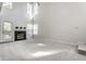 Open living space with a fireplace, stairs, and an eat-in kitchen area at 9338 Eden Woods Ct, Indianapolis, IN 46260