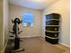 Functional bedroom space with a stack of storage boxes and exercise equipment at 935 Fry Rd, Greenwood, IN 46142