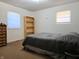 Bright bedroom features natural light, wood furniture and neutral carpet at 935 Fry Rd, Greenwood, IN 46142