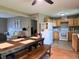 Open-concept living area flows into a kitchen with wooden cabinets and modern appliances at 935 Fry Rd, Greenwood, IN 46142