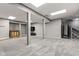 Finished basement with gray walls, recessed lighting, bar area, and neutral carpeting at 945 Baywood Ct, Columbus, IN 47201